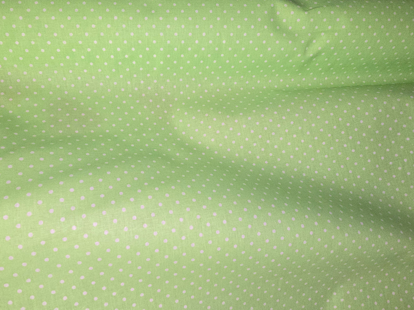 100% Cotton Apple Green Dot on White Super 150cm width perfect for Summer makes!