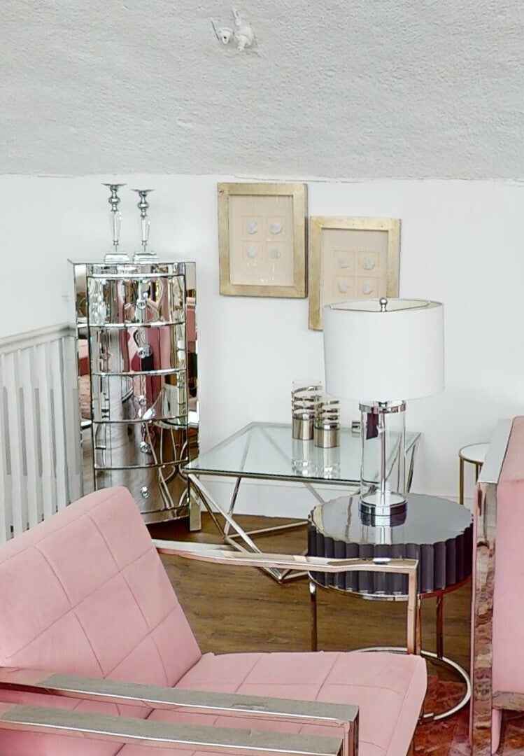 Amreli Small Vertical Textured Silver Metal Hurricane Candle Holder.