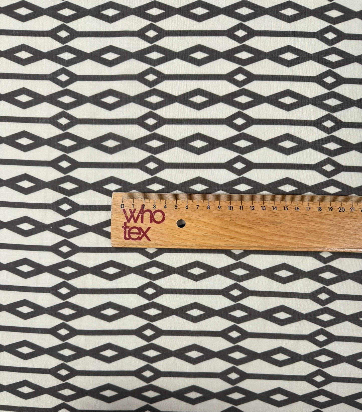Geometric Diamond Fabric – Black & Beige Minimal Print by the Metre
