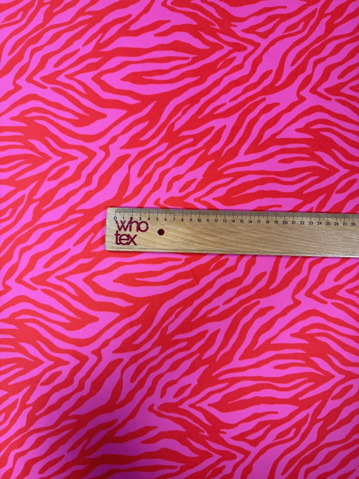 Red and Pink Patterned Tiger Striped Fabric Sold by Metre