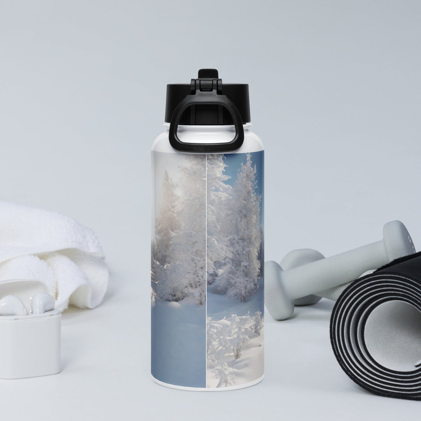 Stainless steel water bottle with a straw lid