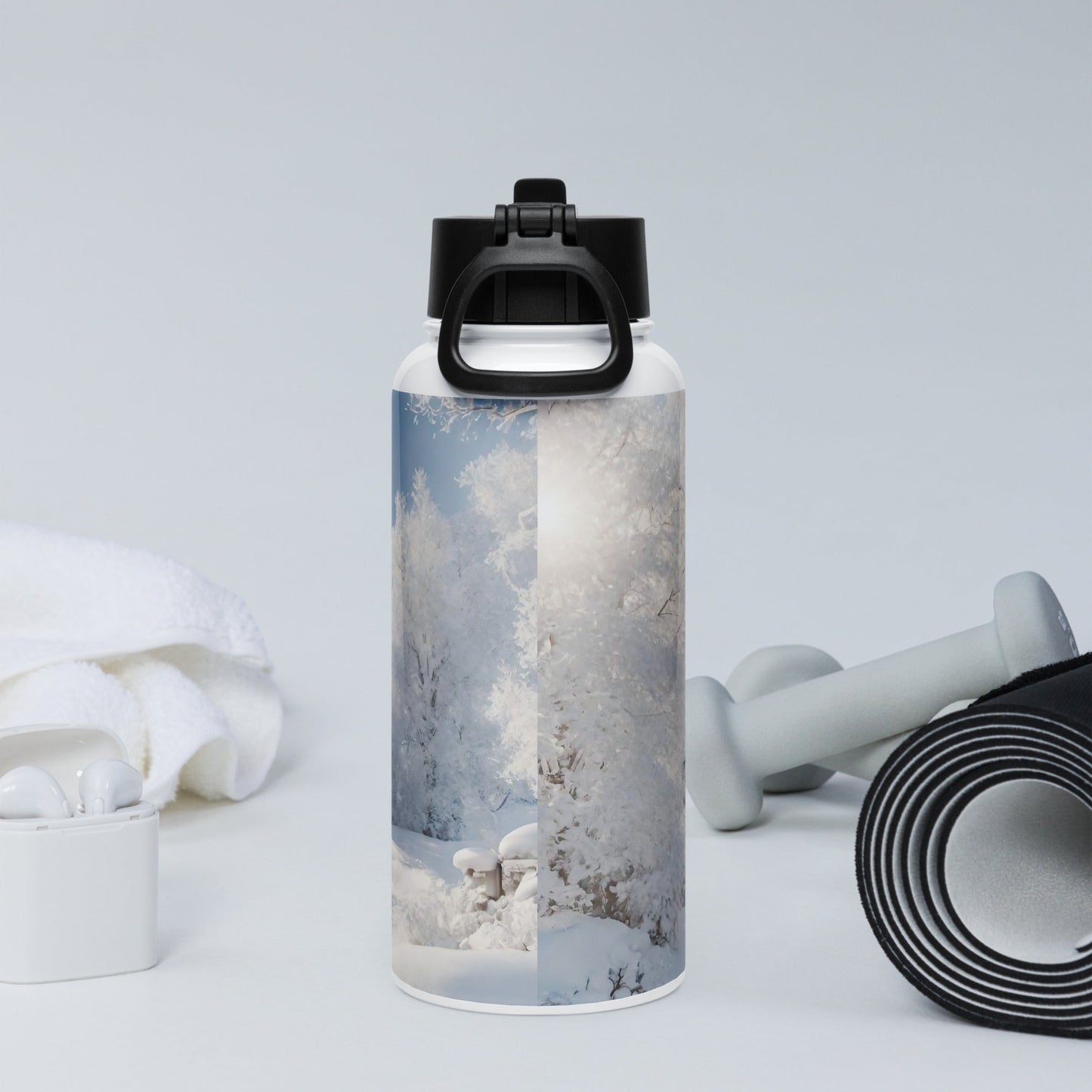Stainless steel water bottle with a straw lid