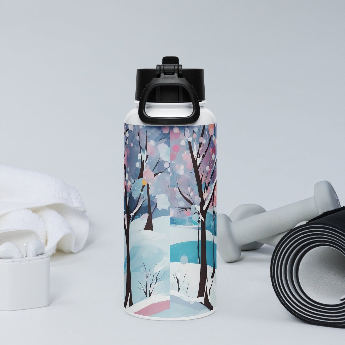 Stainless steel water bottle with a straw lid