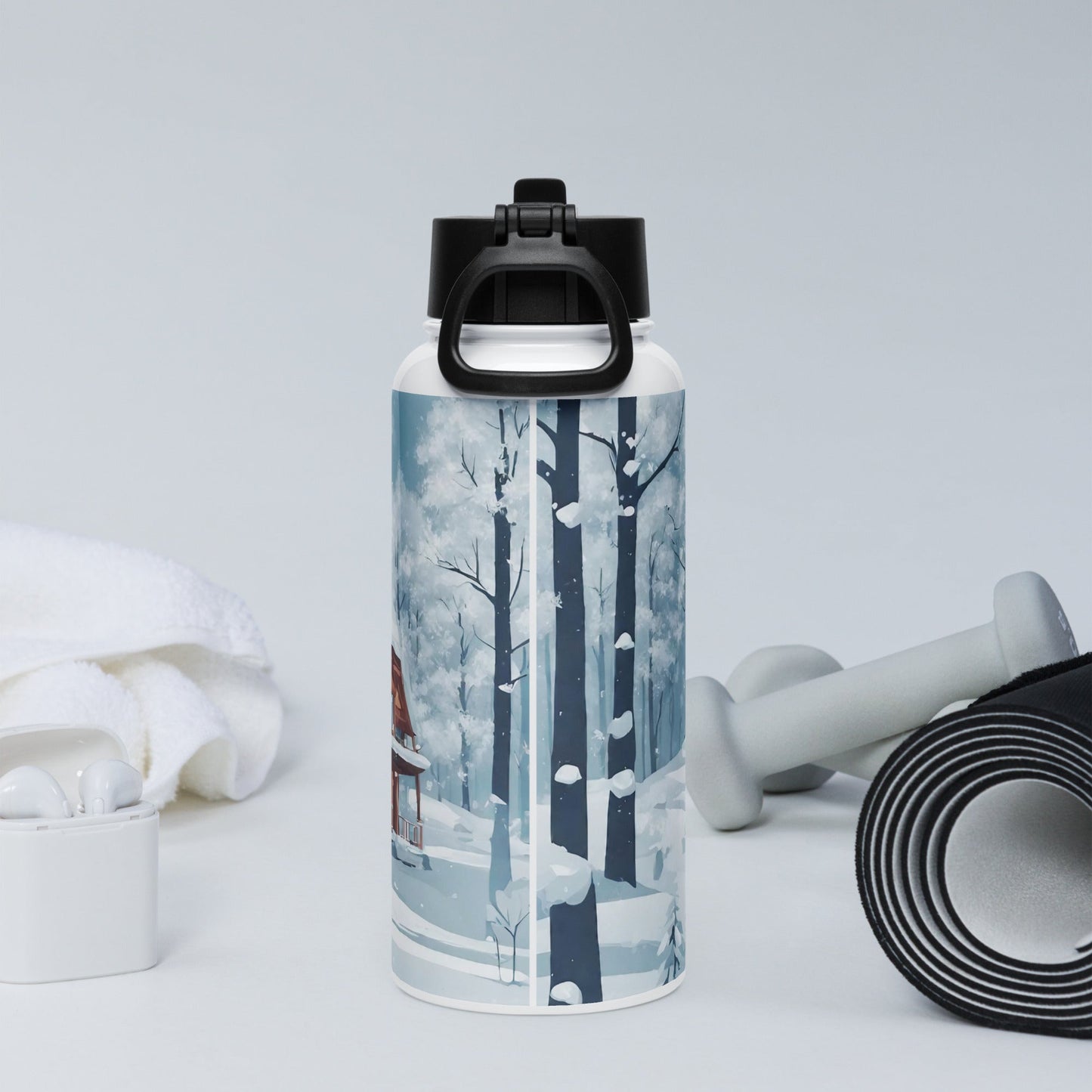 Stainless steel water bottle with a straw lid