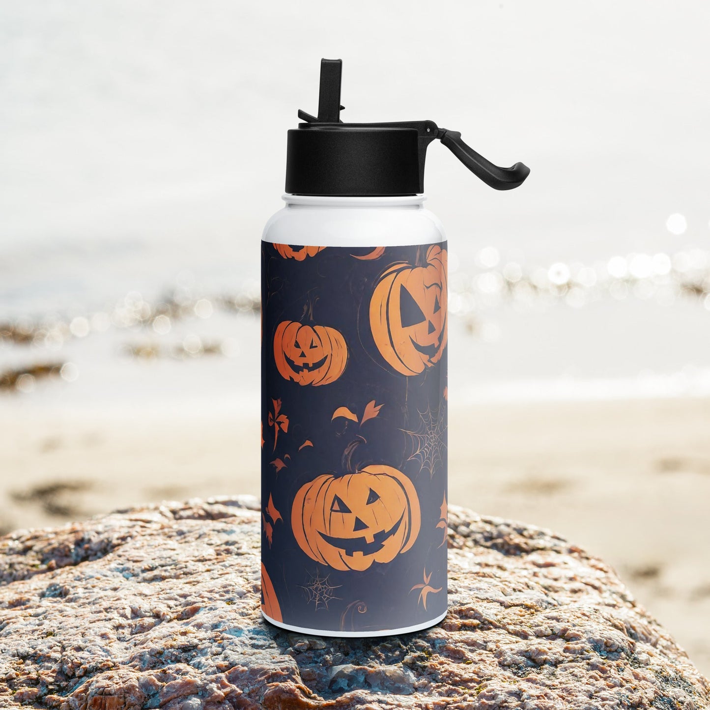 Stainless steel water bottle with a straw lid