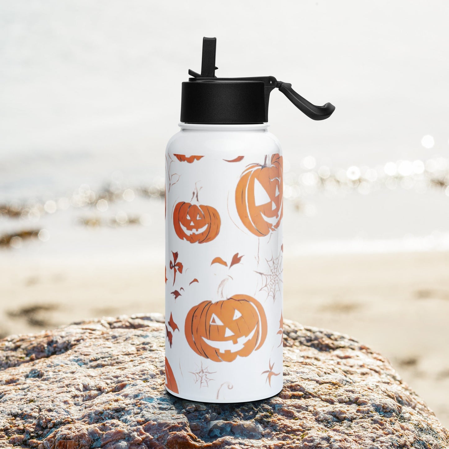 Stainless steel water bottle with a straw lid