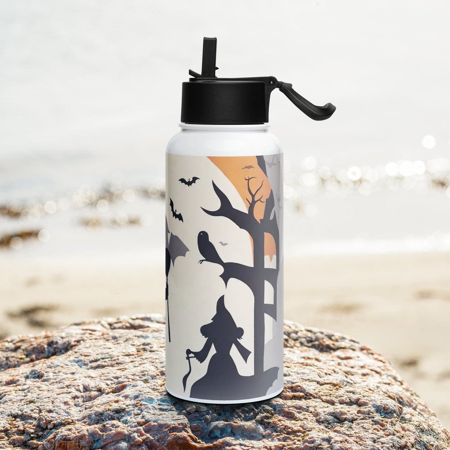 Stainless steel water bottle with a straw lid