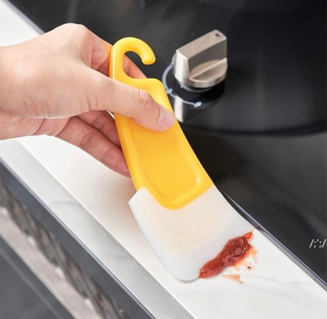 Yellow cooking / cleaning spatula