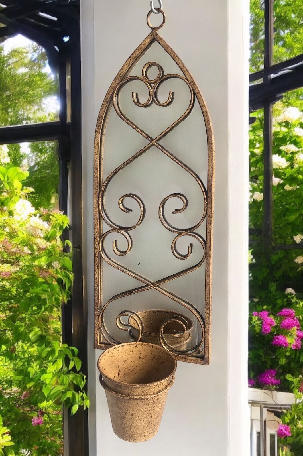 56cm RUSTY WALL MIRROR WITH SINGLE PLANTER