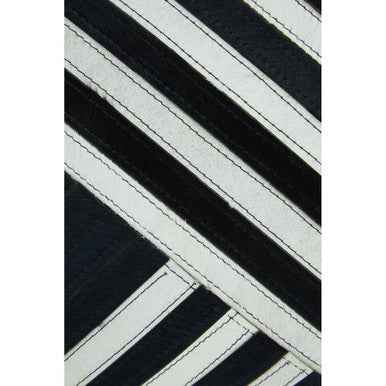 Bosie Safira Black and White Hair on Leather Cushion