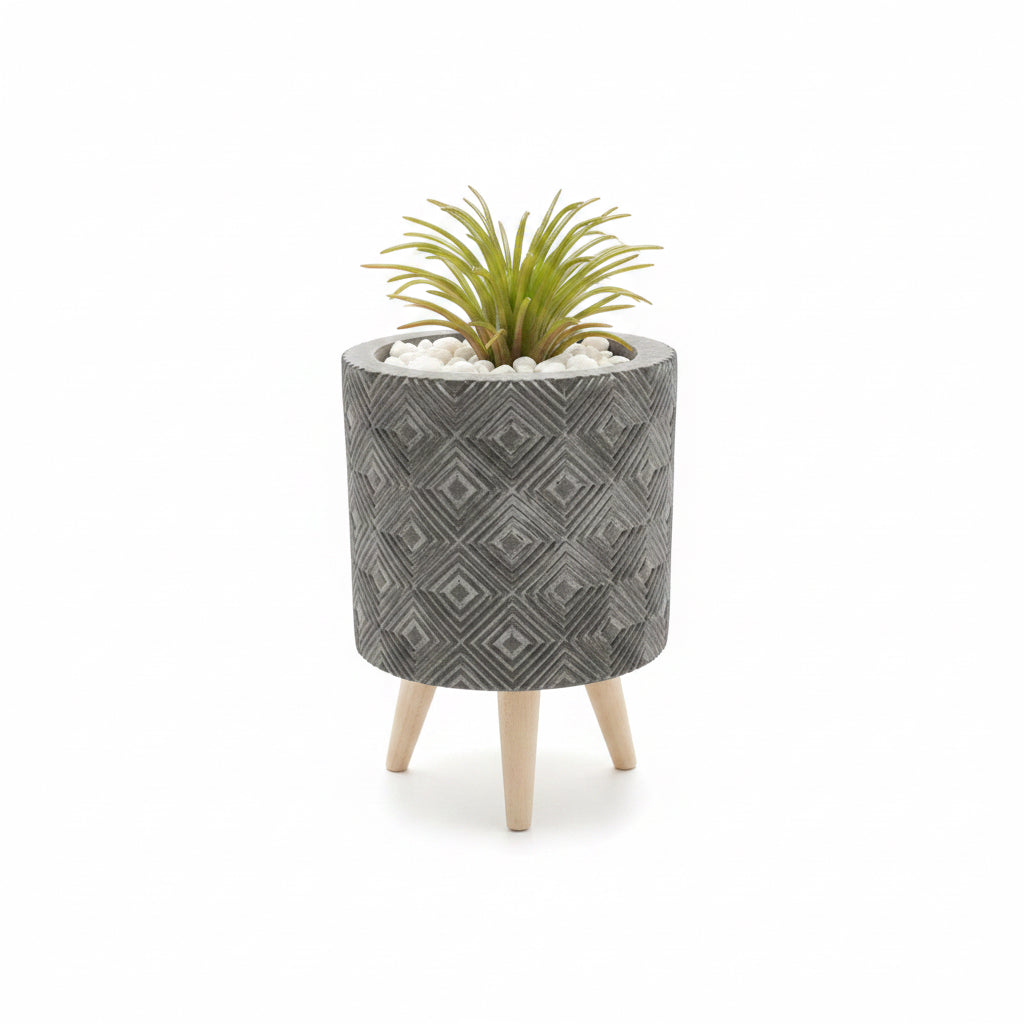 Artificial plant in pot on stand