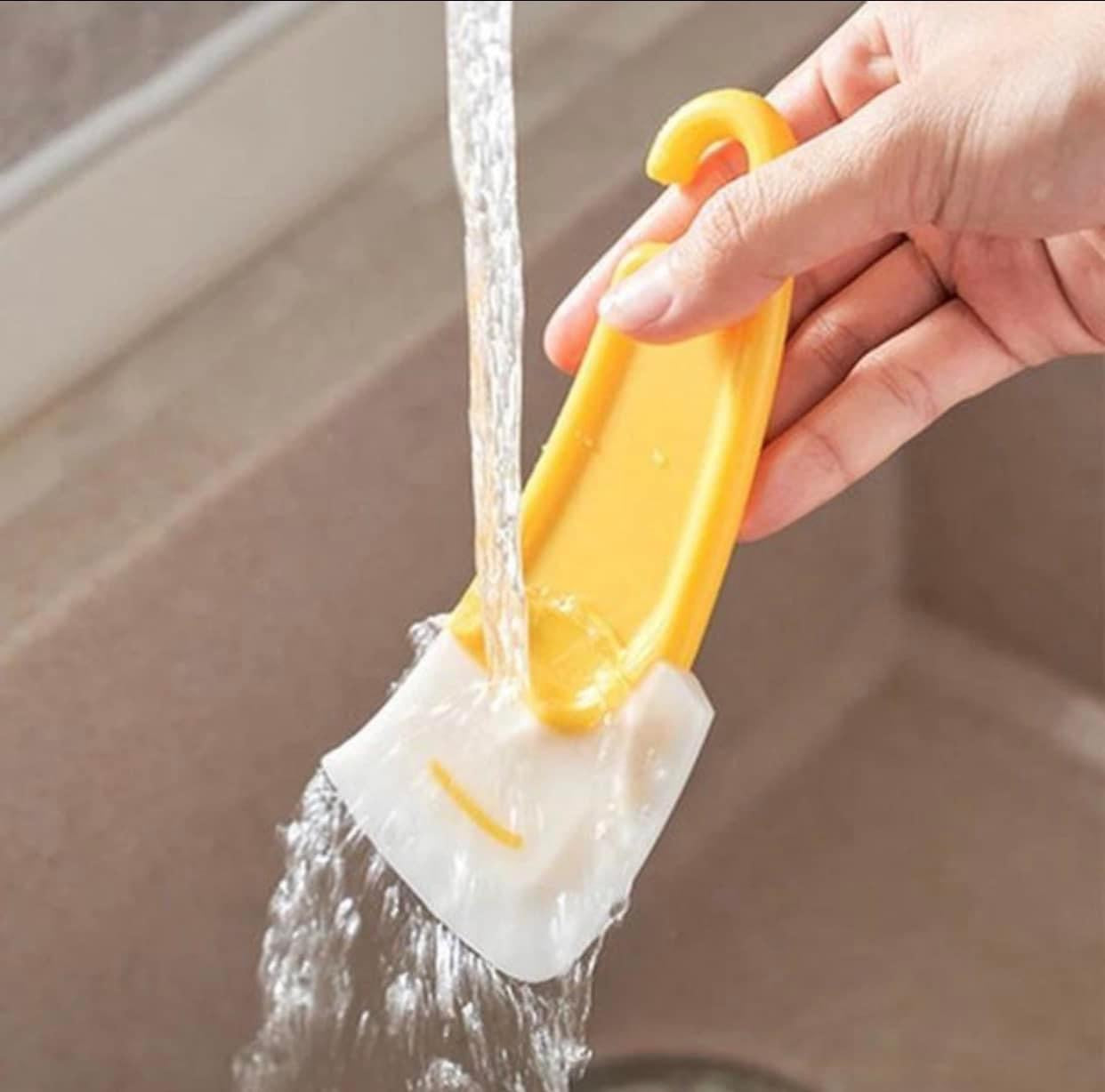 Yellow cooking / cleaning spatula