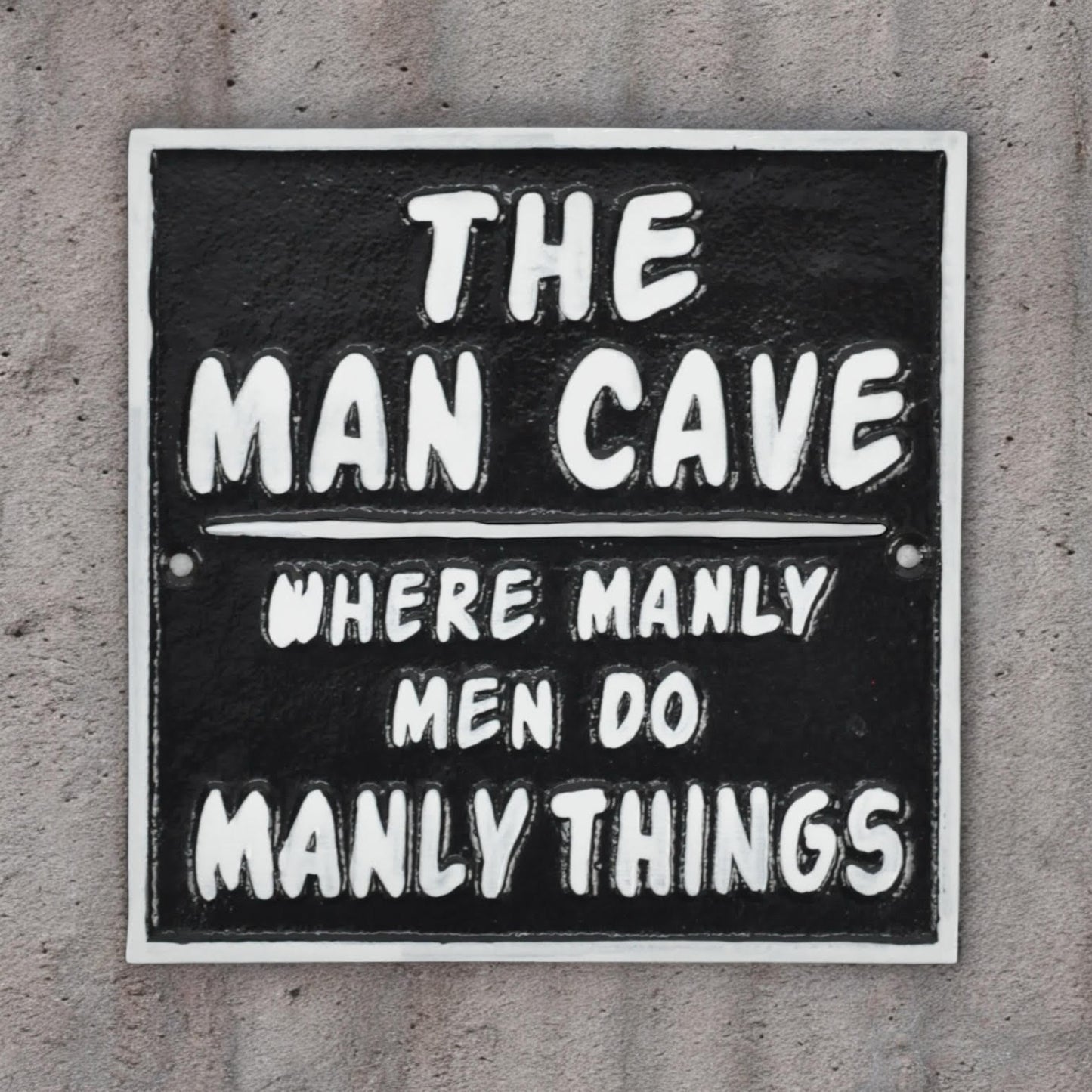 20CM CAST IRON THE MAN CAVE WALL SIGN