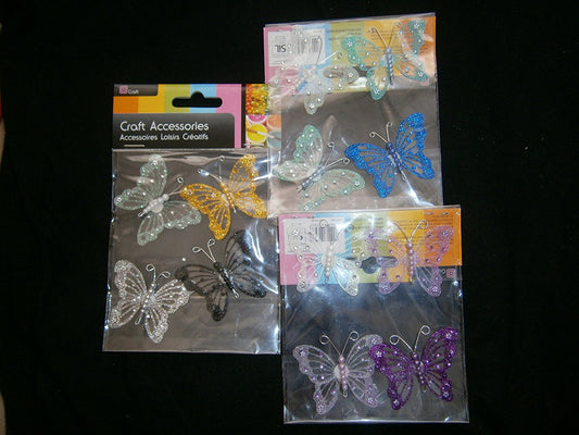4 glittery butterfly embelishments various colours one supplied