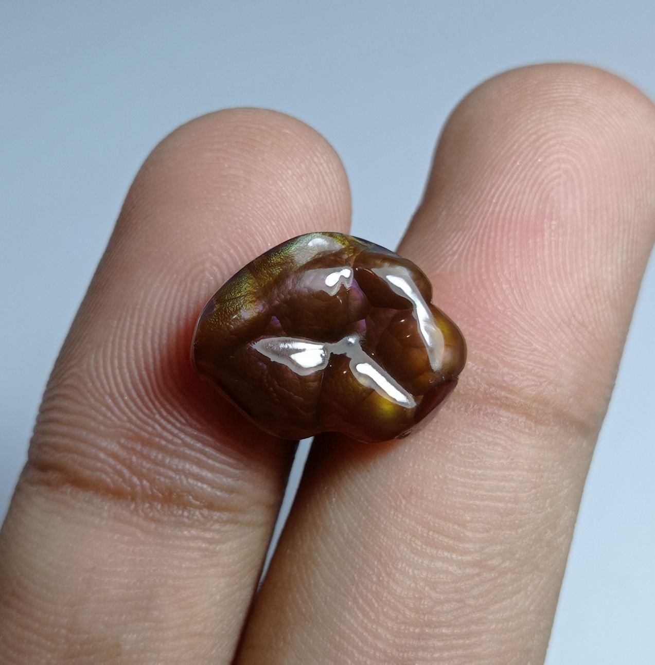 10.5ct Carved Purple Fire Agate -  Dimensions 17x13x5mm