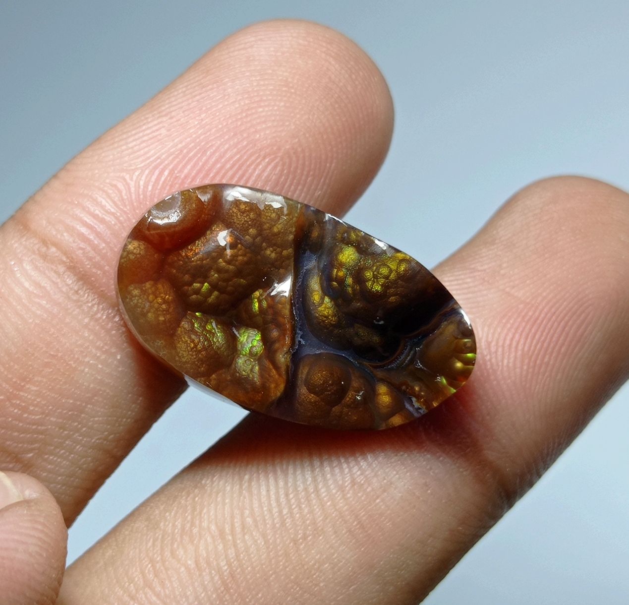19ct Natural Long-Oval Carved Rare Mexican Fire Agate, Dimensions 26x15x6mm