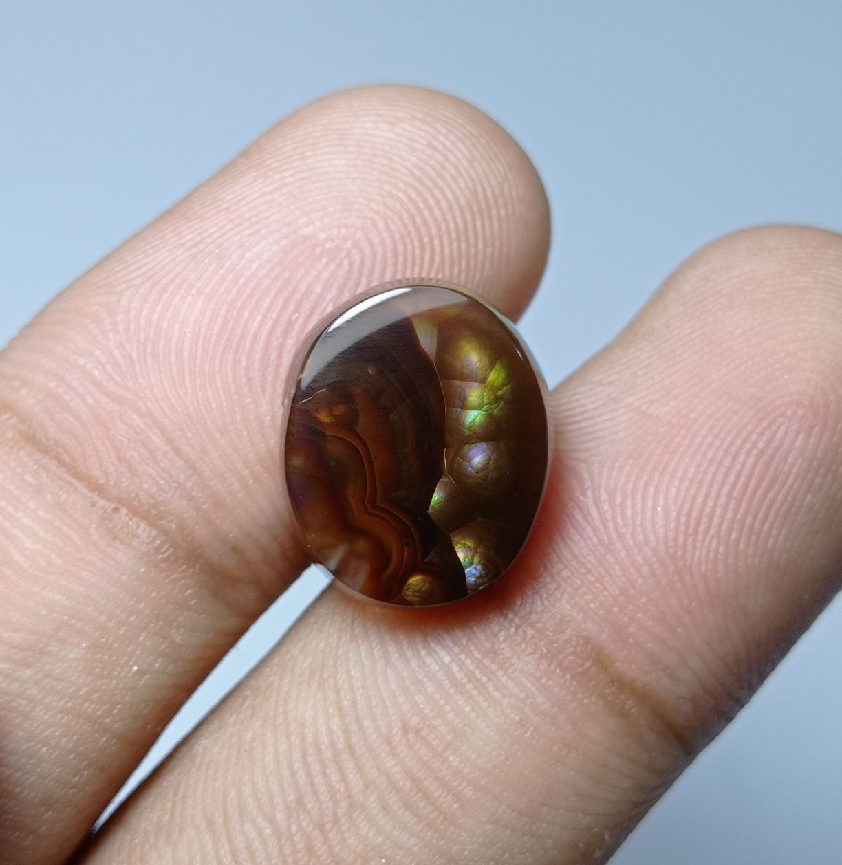 8.4ct Mexican Oval Shape Fire Agate - Purple & Green Fire- Dimensions 15x12x5mm