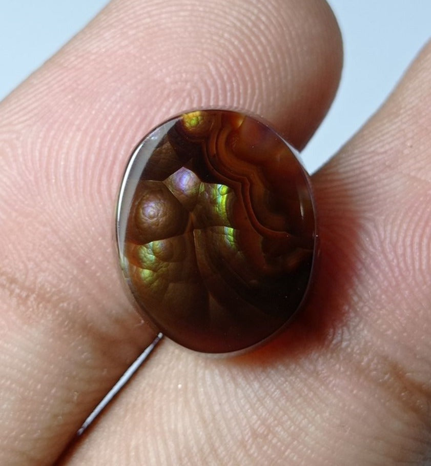 8.4ct Mexican Oval Shape Fire Agate - Purple & Green Fire- Dimensions 15x12x5mm