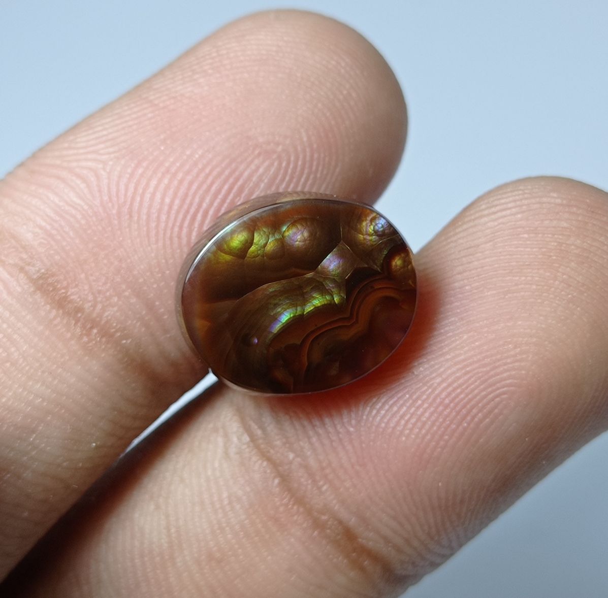 8.4ct Mexican Oval Shape Fire Agate - Purple & Green Fire- Dimensions 15x12x5mm