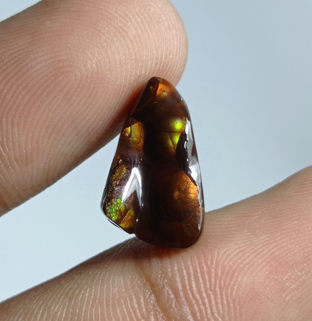 8.6ct MultiColored Carved Fire Agate, Dimensions 16x10.5x6mm