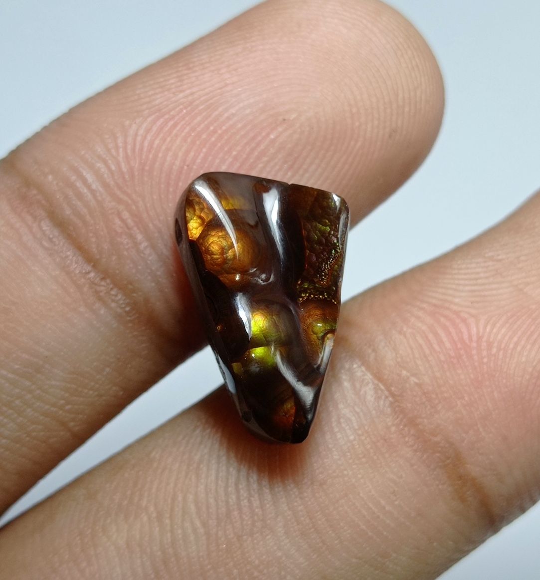 8.6ct MultiColored Carved Fire Agate, Dimensions 16x10.5x6mm