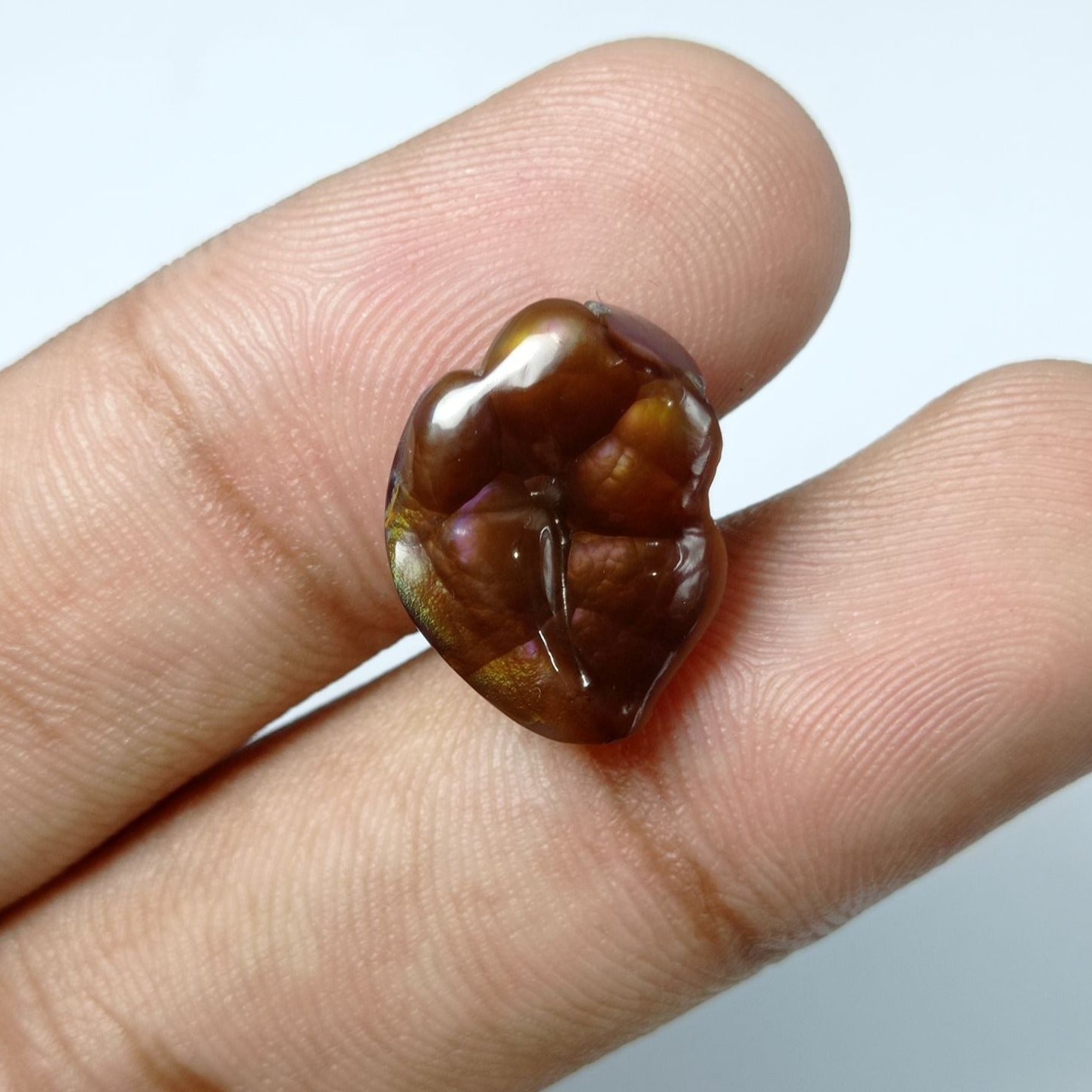 10.5ct Carved Purple Fire Agate -  Dimensions 17x13x5mm