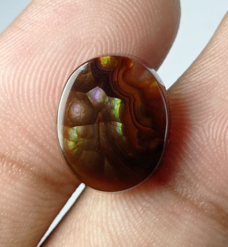 8.4ct Mexican Oval Shape Fire Agate - Purple & Green Fire- Dimensions 15x12x5mm