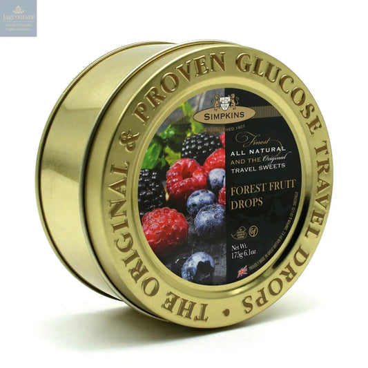 Gold embossed tin of forest fruit flavour travel sweets