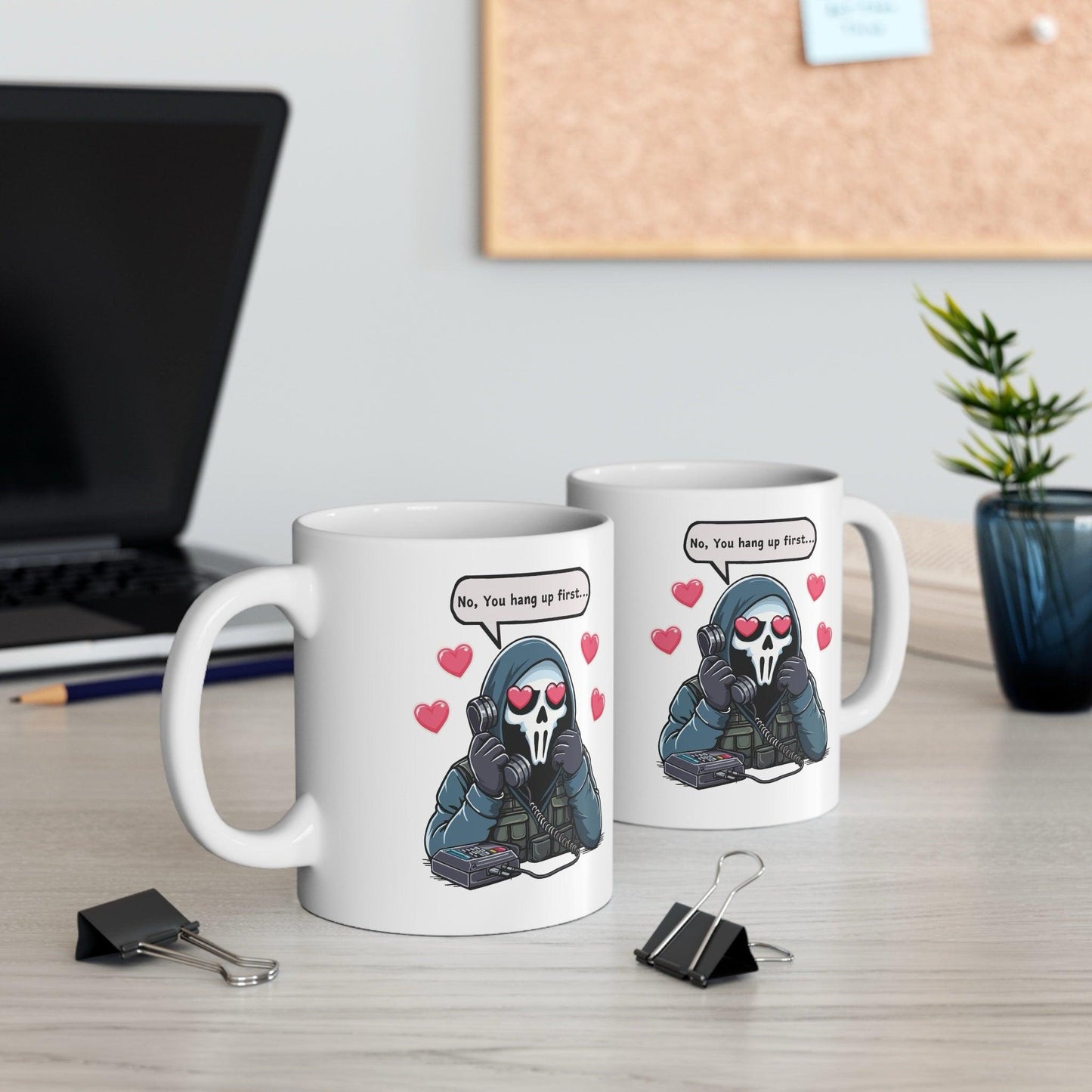 “No, you hang up first...” Mug