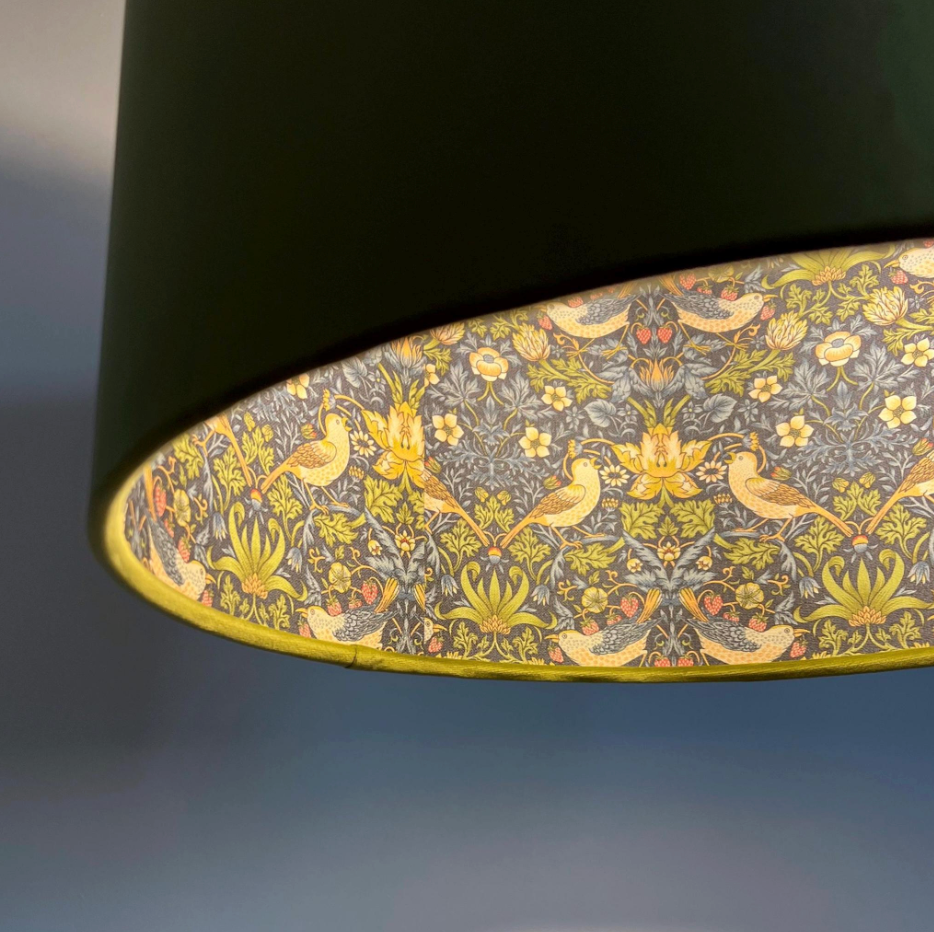 Olive green velvet drum lampshade, double sided lampshade, with navy strawberry thief cotton interior