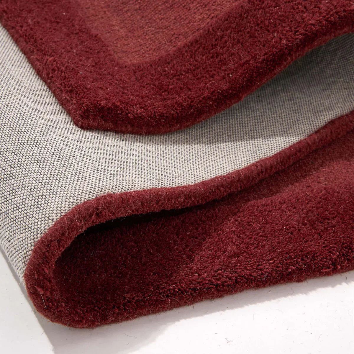Origins Stacked Border Rug | Wine Red