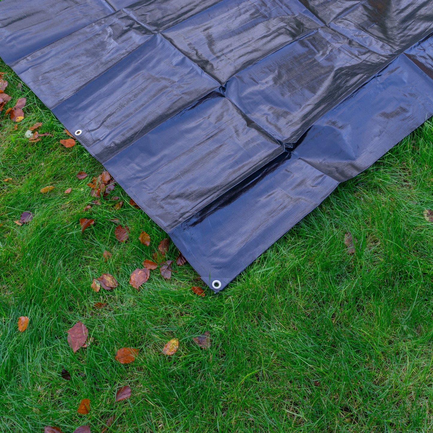 Black/Silver L-Grade Tarpaulin with 10 Metres of 8mm Bungee Rope