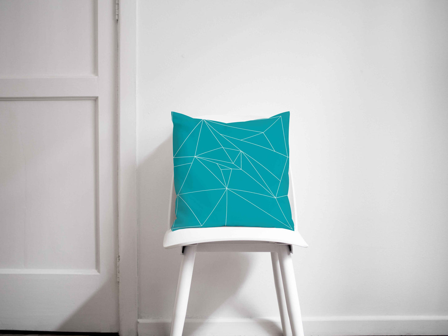 Turquoise Cushion with a White Geometric Design, Throw Pillow