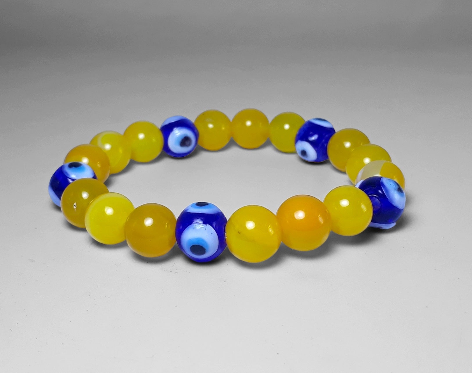 Confidence and Protection Bracelet - Natural 10mm Yellow Agate with Evil Eye Protection Bead