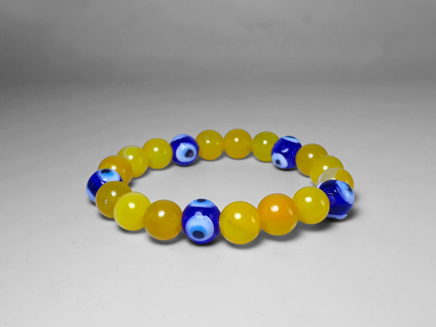 Confidence and Protection Bracelet - Natural 10mm Yellow Agate with Evil Eye Protection Bead