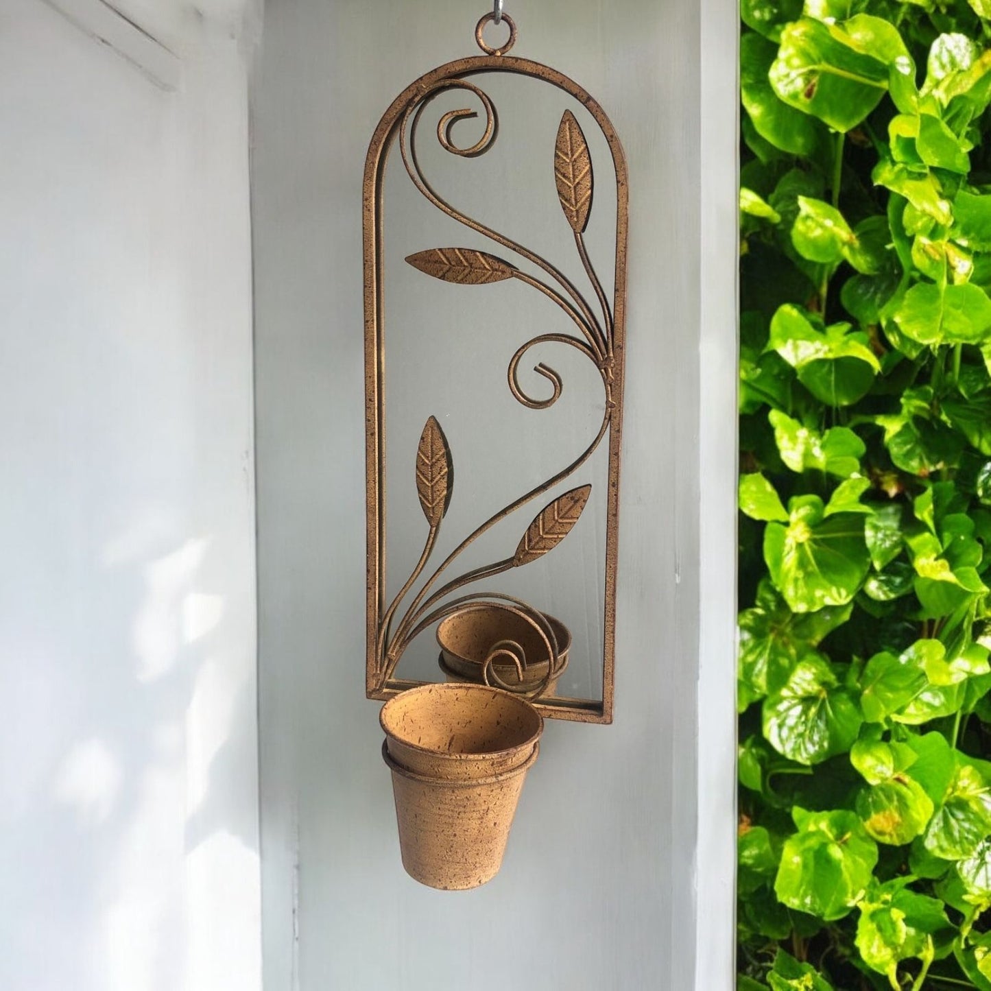 56CM RUSTY WALL MIRROR WITH PLANTER