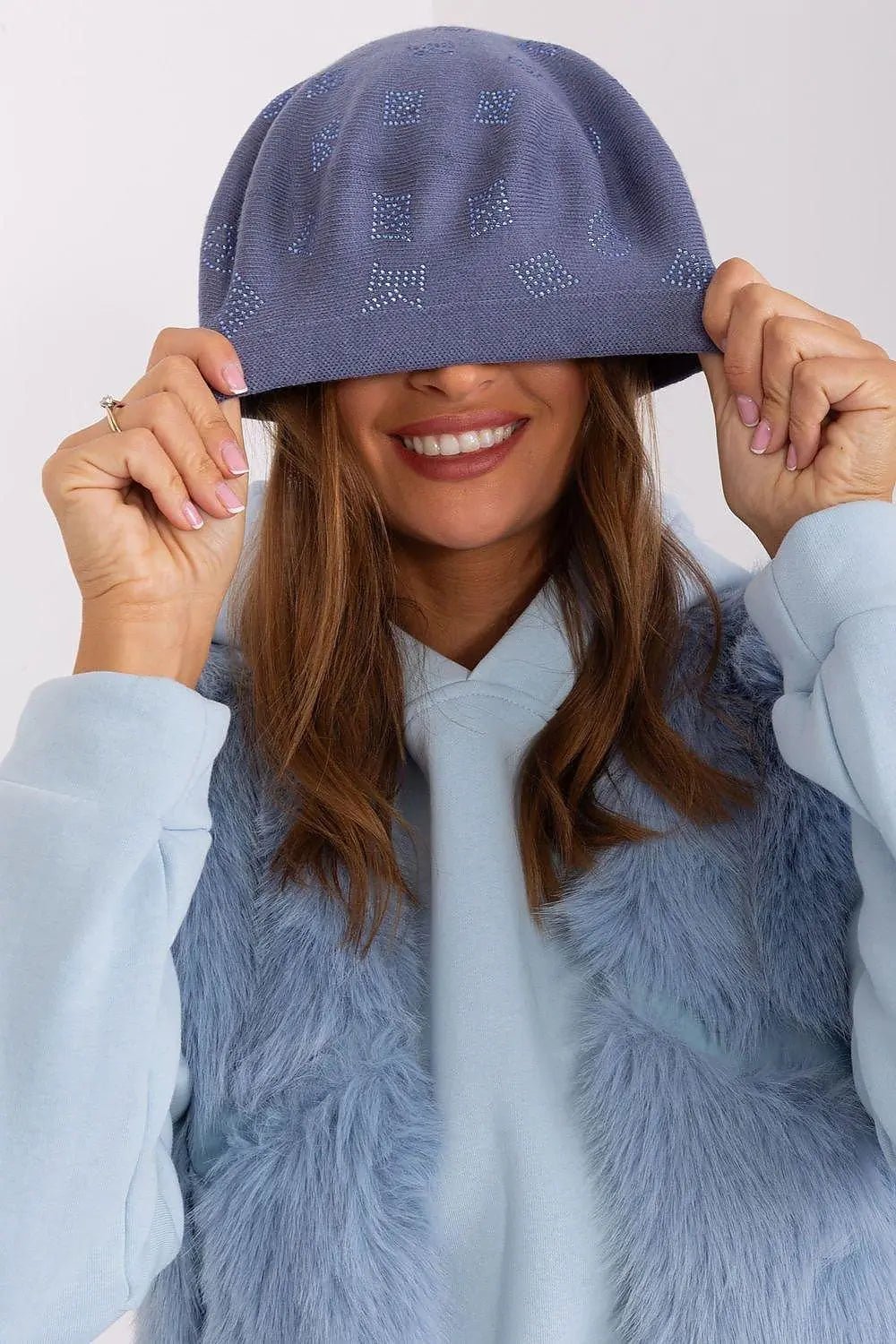AT Knitted beret with interesting rhinestone application.