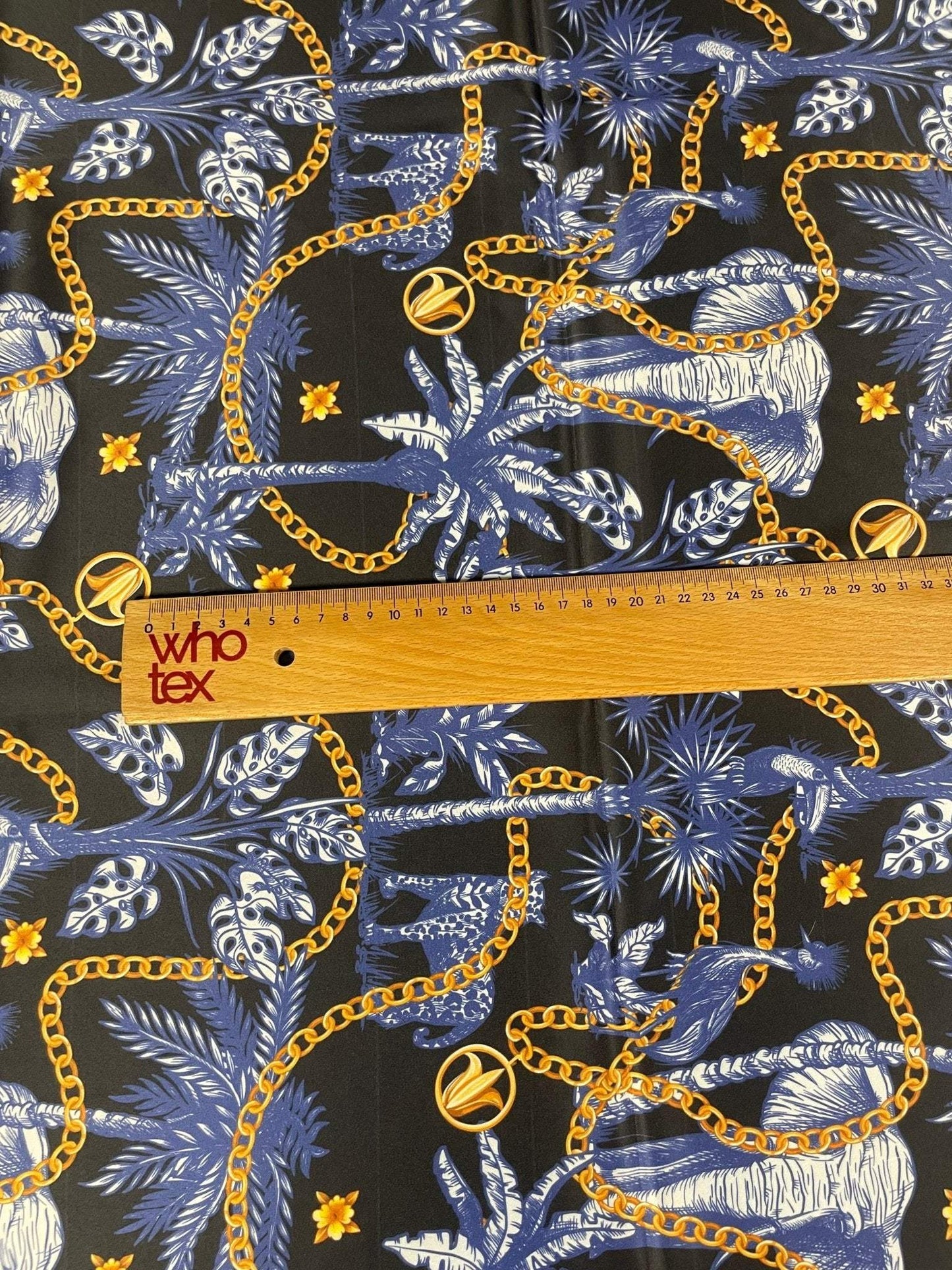 Black and Blue Tropical Fabric with Gold Chains  Fabric by Metre
