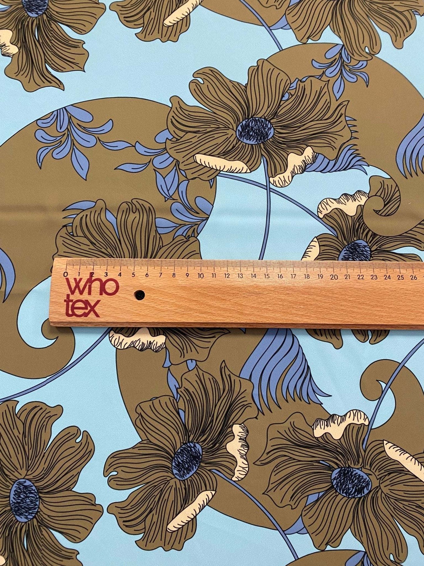 Brown Floral Print Fabric on Light Blue Background by Metre