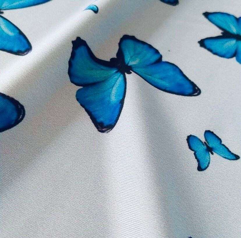 Baby Blue Butterfly Fabric Sold by Metre
