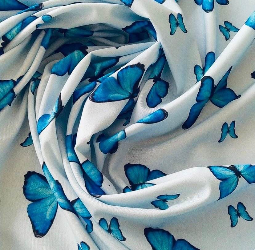 Baby Blue Butterfly Fabric Sold by Metre