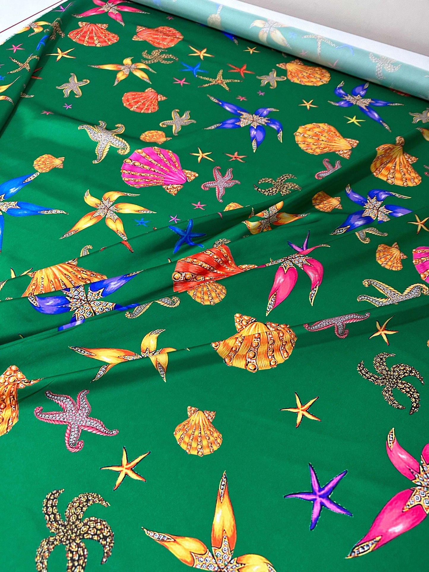 Sea Shell Pattern Green Fabric Sold by Metre