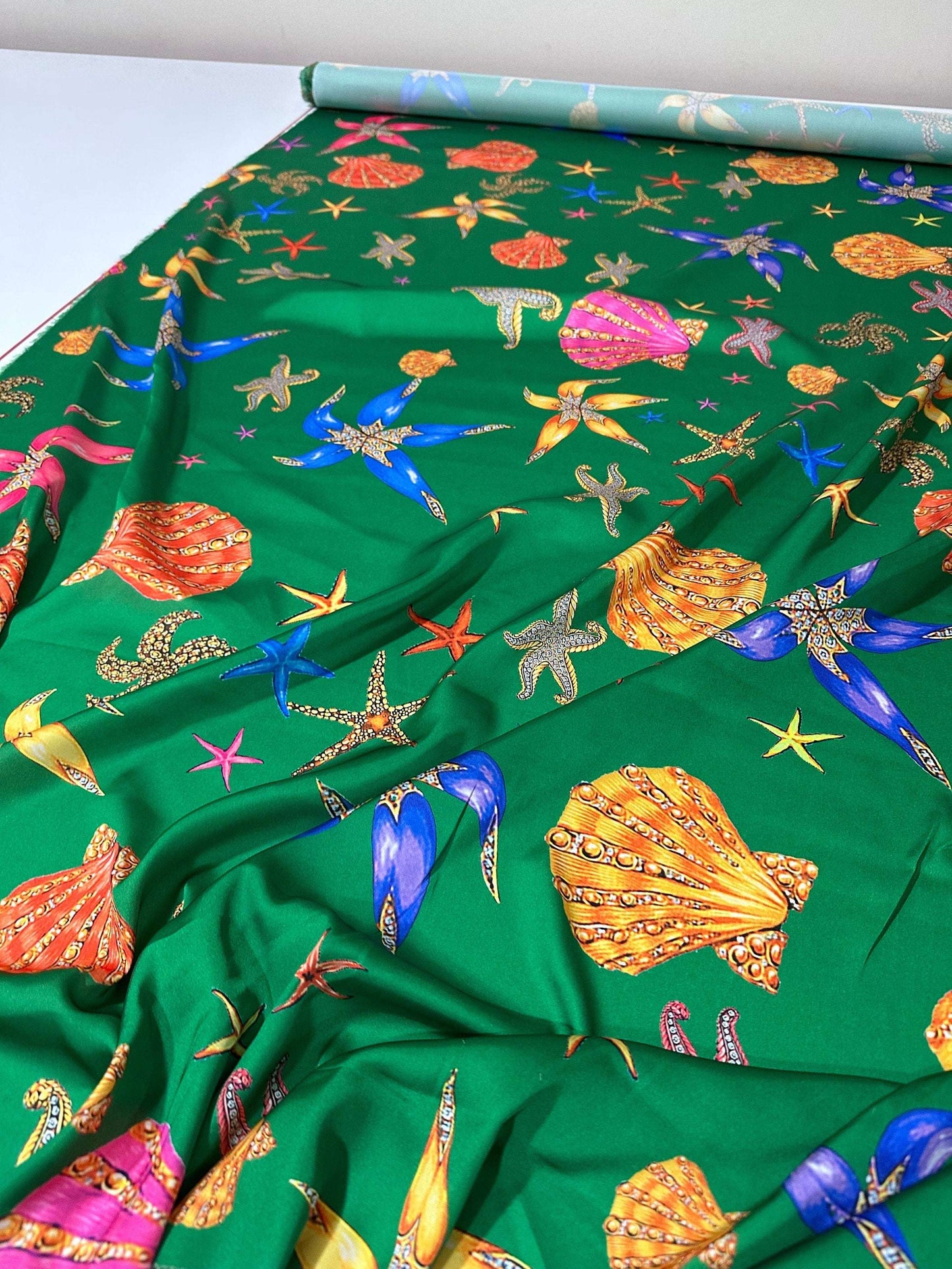 Sea Shell Pattern Green Fabric Sold by Metre