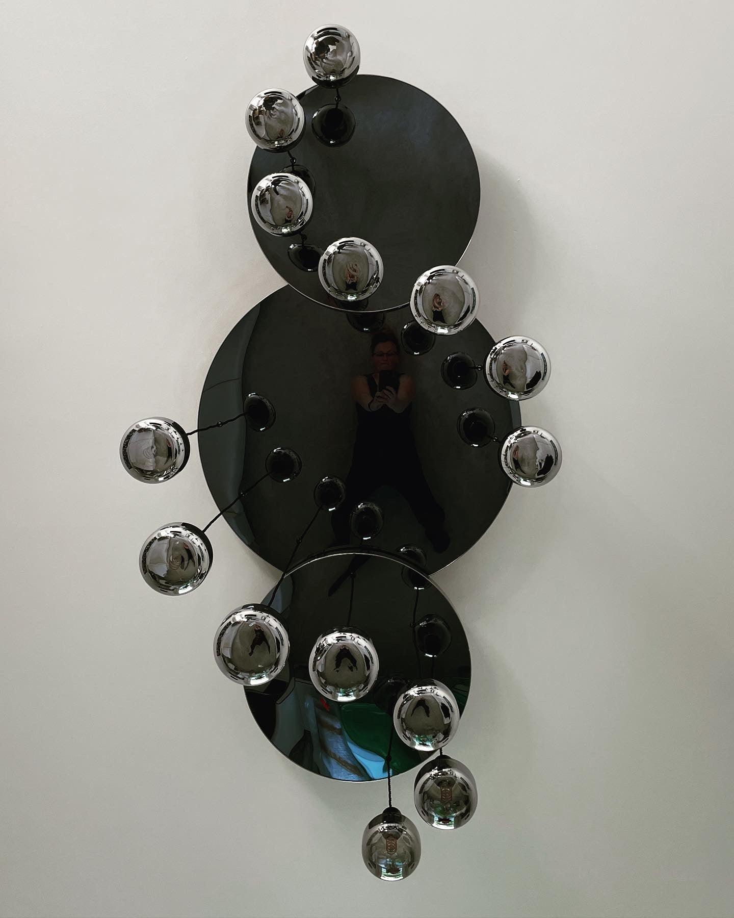 Modern Waves: Stainless Steel Mirrored Chandelier