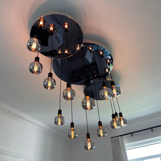 Modern Waves: Stainless Steel Mirrored Chandelier