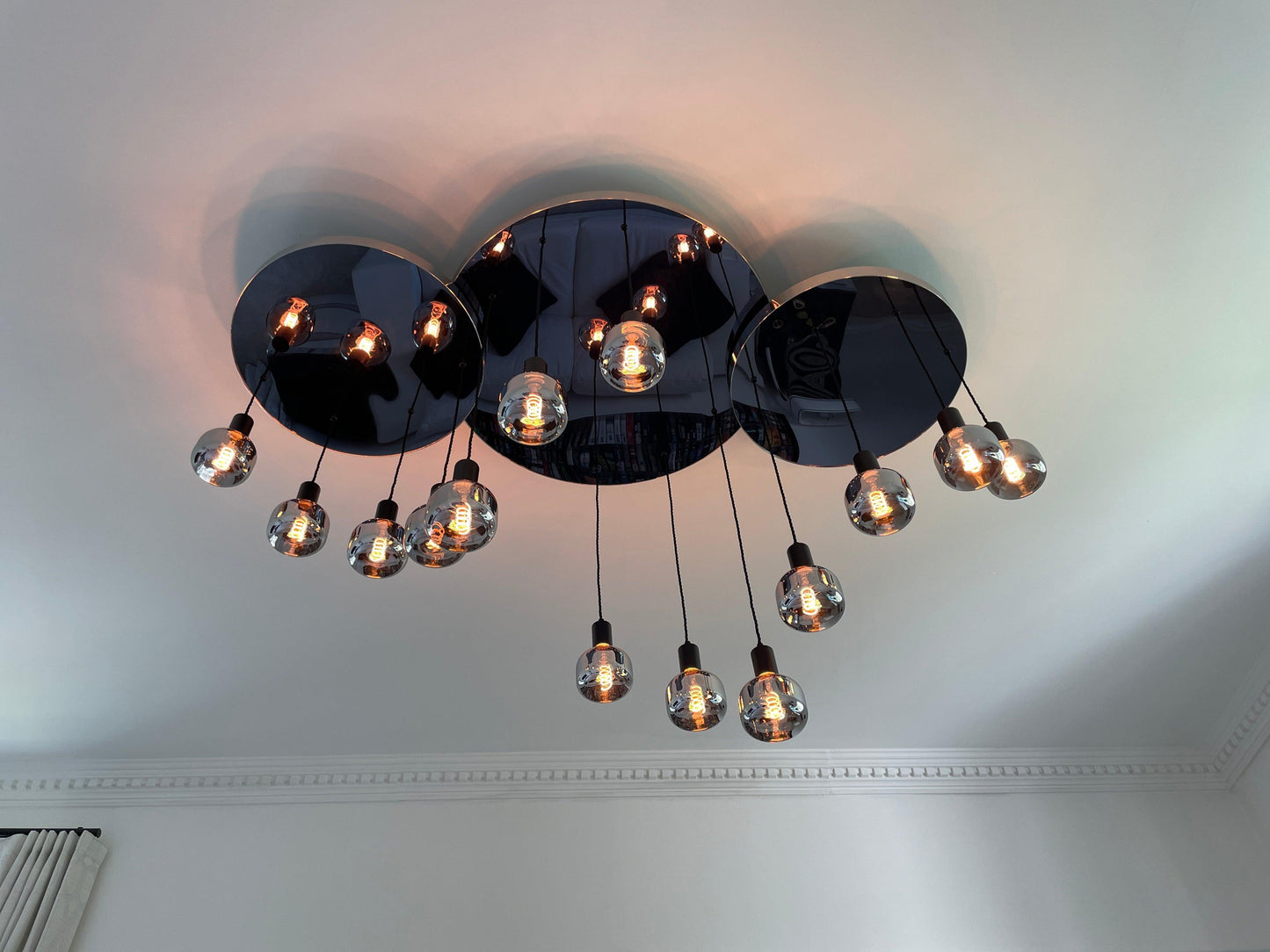 Modern Waves: Stainless Steel Mirrored Chandelier