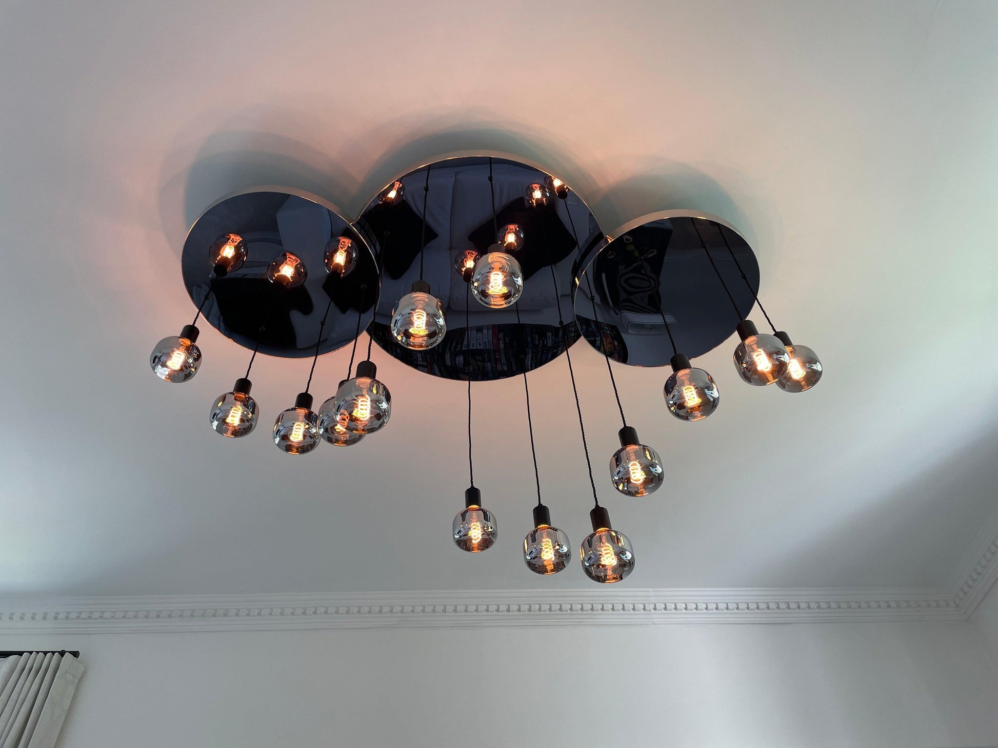 Modern Waves: Stainless Steel Mirrored Chandelier