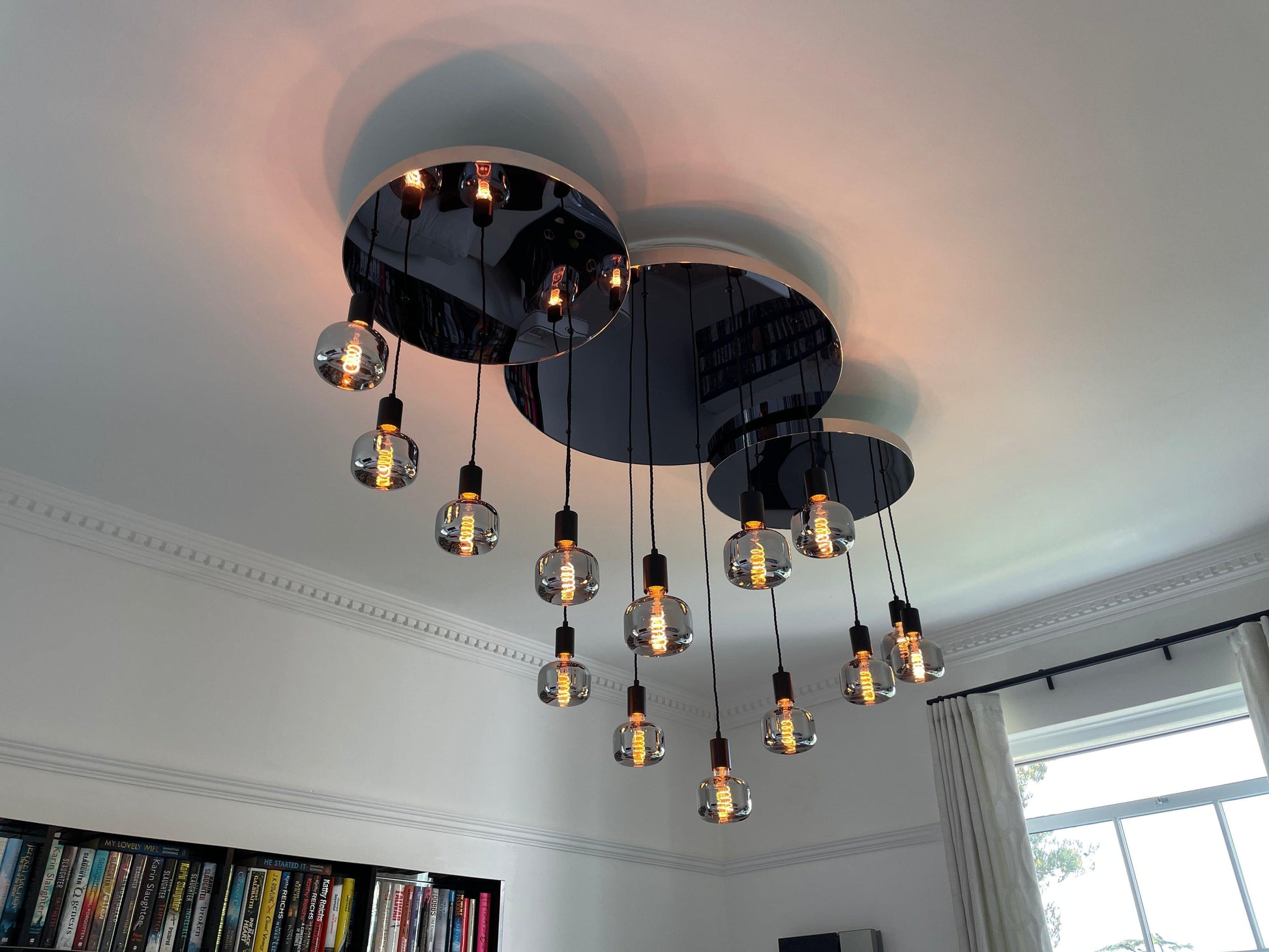 Modern Waves: Stainless Steel Mirrored Chandelier