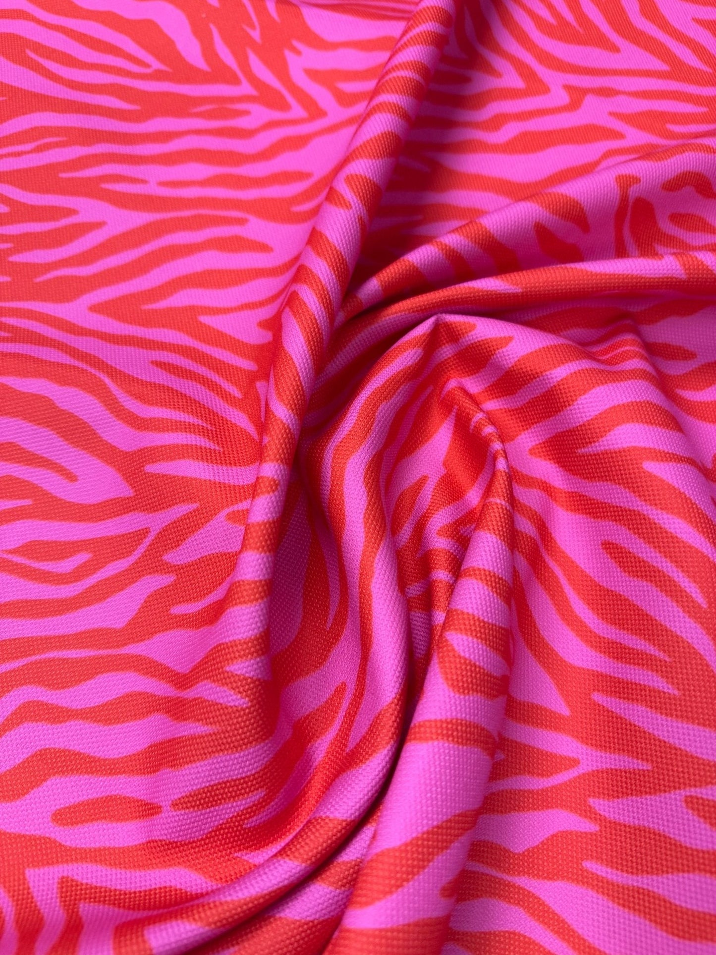 Red and Pink Patterned Tiger Striped Fabric Sold by Metre