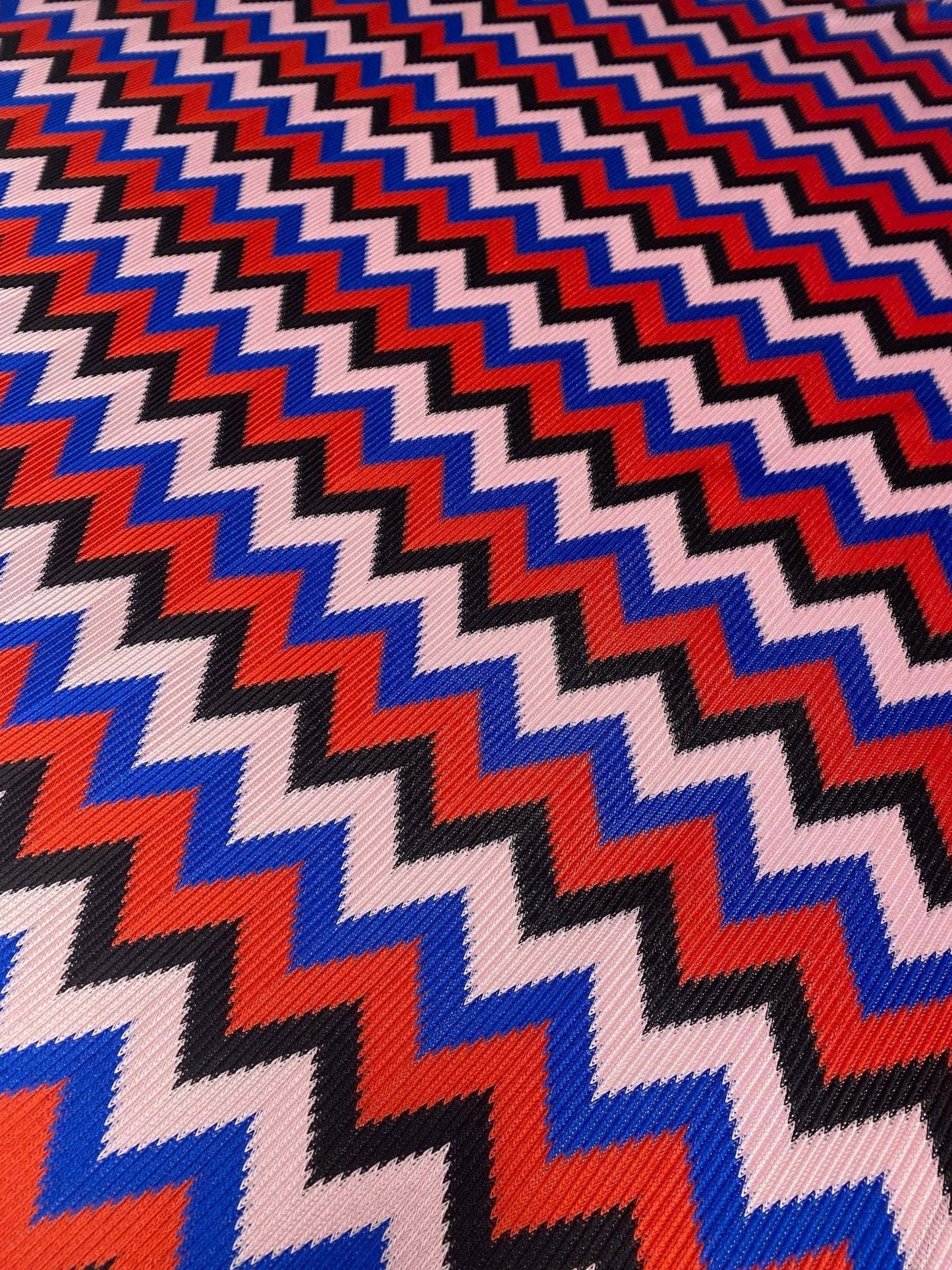 Bold Zigzag Mesh Knit Fabric in Red Blue and Black by the Metre